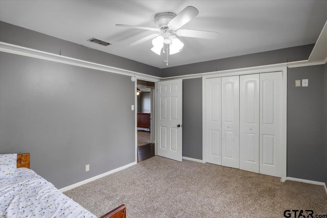 1216 Kingspark Dr, Tyler, TX 75703 - bedroom featuring baseboards, a closet, visible vents, and carpet
