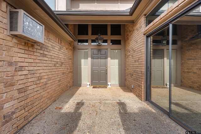 doorway to property featuring a patio