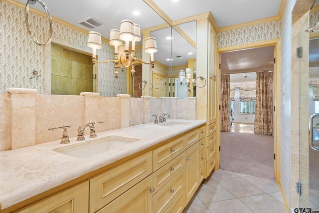 bathroom featuring tile patterned flooring, crown molding, an enclosed shower, decorative backsplash, and vanity