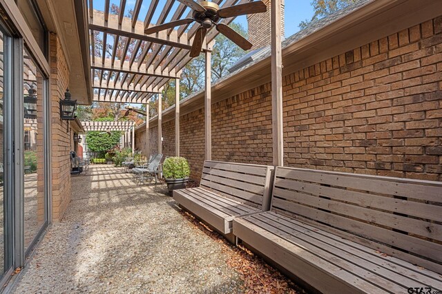 view of side of home with a pergola, ceiling fan, and a patio