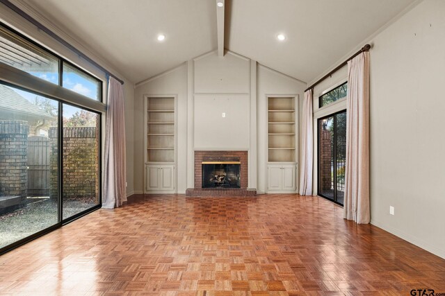 unfurnished living room featuring beam ceiling, built in features, a fireplace, and light parquet floors