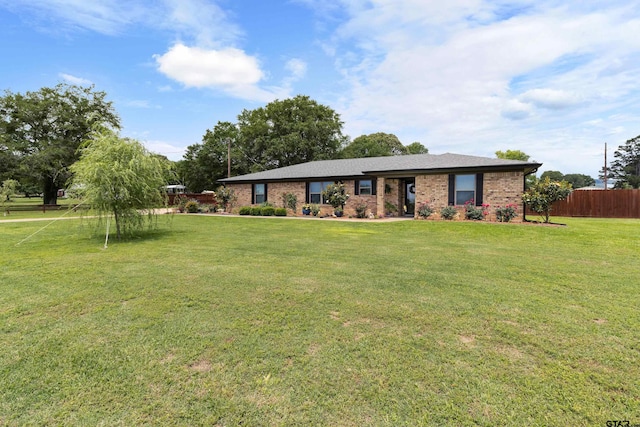 ranch-style house with brick siding
