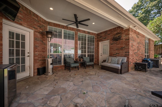 view of patio / terrace featuring ceiling fan