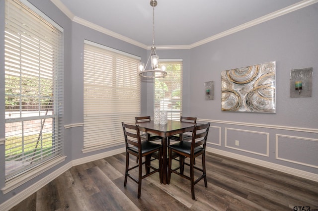 dining area with crown molding, a healthy amount of sunlight, and dark hardwood / wood-style flooring