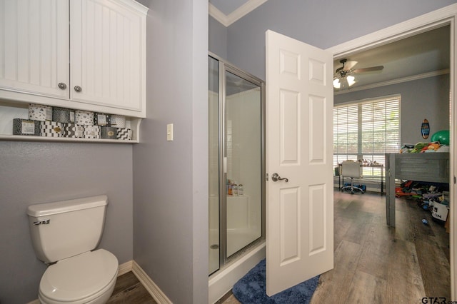 bathroom featuring walk in shower, ornamental molding, and hardwood / wood-style floors