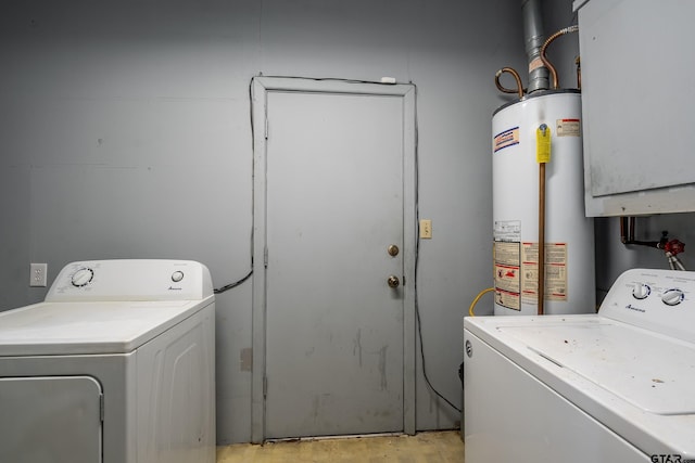 laundry room featuring gas water heater and washer and clothes dryer