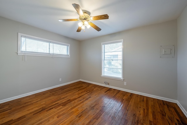 unfurnished room with ceiling fan, plenty of natural light, and hardwood / wood-style flooring