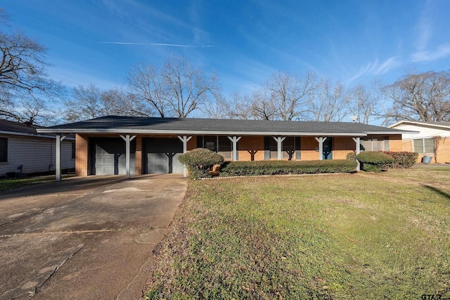 single story home featuring a front lawn and a carport