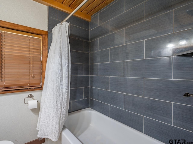 22090 Sportsmans Dr, Chandler, TX 75758 - bathroom featuring shower / bath combination with curtain