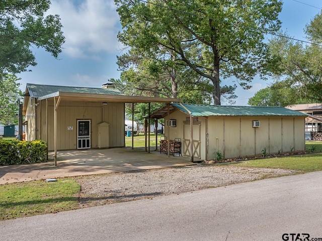 22090 Sportsmans Dr, Chandler, TX 75758 - view of outbuilding with driveway