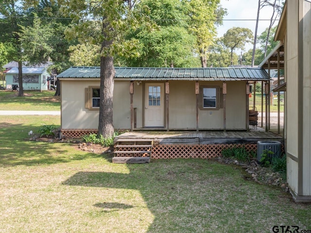 22090 Sportsmans Dr, Chandler, TX 75758 - view of outbuilding featuring central air condition unit