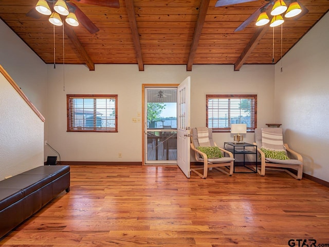 22090 Sportsmans Dr, Chandler, TX 75758 - living area with a ceiling fan, wooden ceiling, wood finished floors, and baseboards