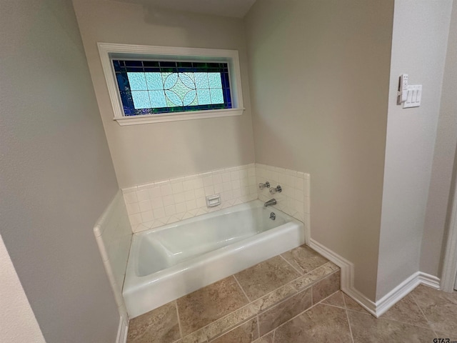 bathroom featuring a washtub