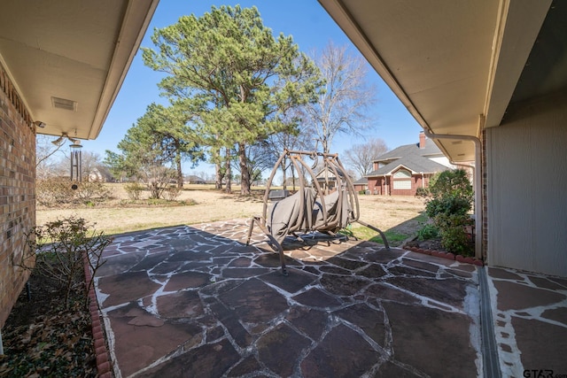 view of patio / terrace featuring visible vents