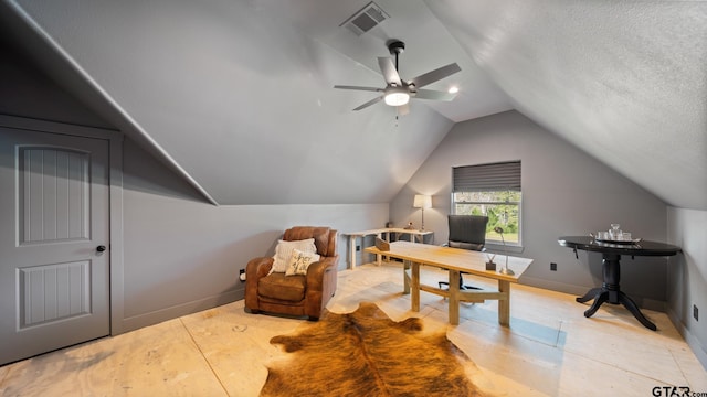 home office with baseboards, a ceiling fan, vaulted ceiling, and visible vents