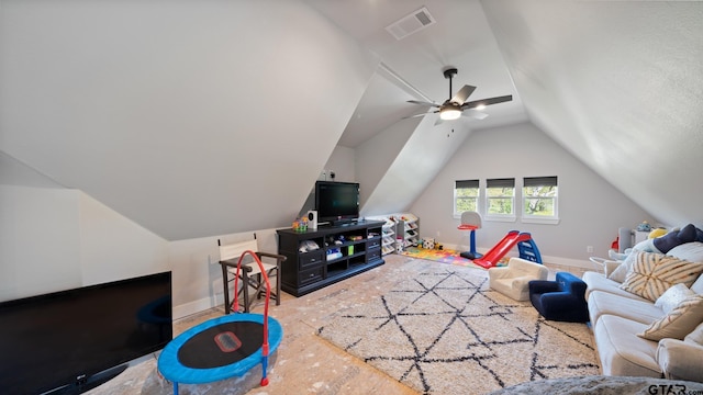 game room featuring baseboards, ceiling fan, vaulted ceiling, and visible vents