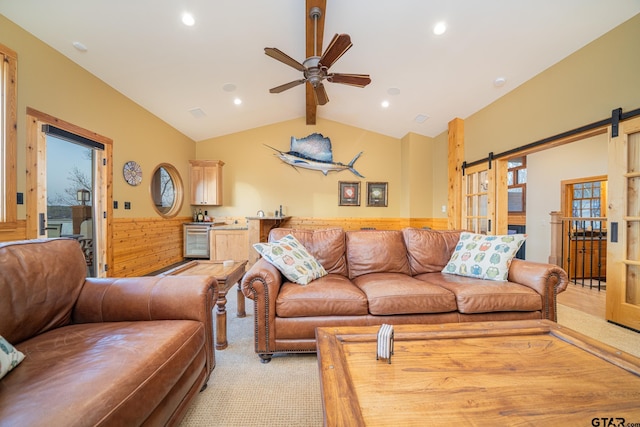 1584 Charlya Dr, Scroggins, TX 75480 - living room with a barn door, ceiling fan, light colored carpet, recessed lighting, and a wainscoted wall