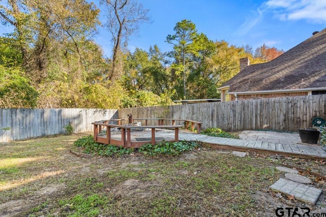 view of yard with a deck