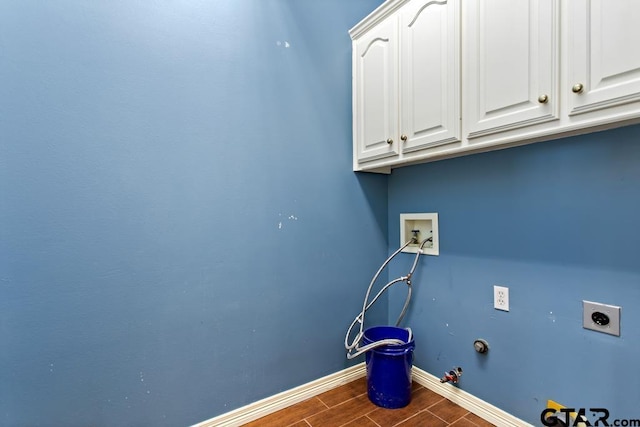 clothes washing area with electric dryer hookup, cabinets, gas dryer hookup, hookup for a washing machine, and dark hardwood / wood-style flooring