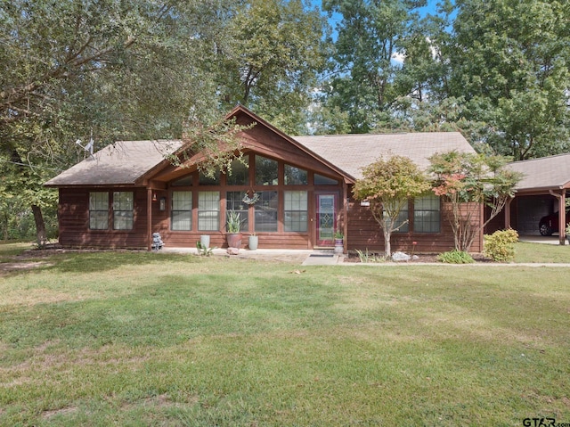 view of front of property with a front lawn