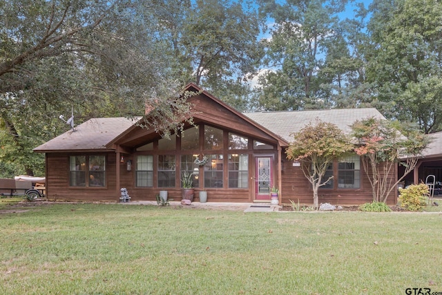 view of front of house with a front lawn