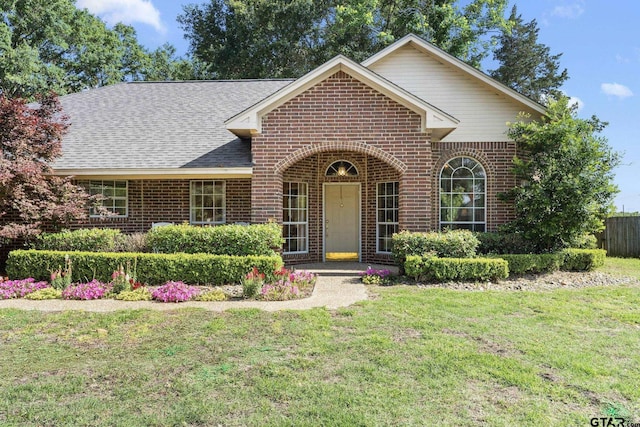 10769 Indigo Ln, Flint, TX 75762 - view of front of house featuring brick siding and a shingled roof