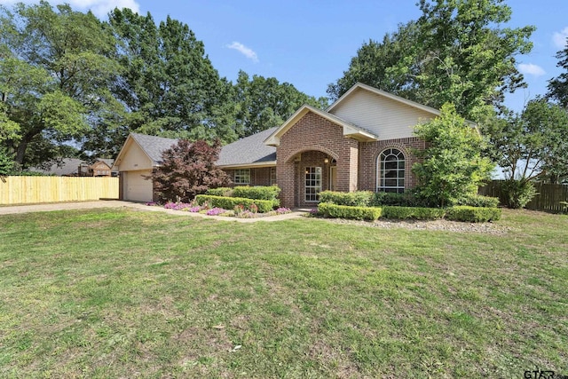 10769 Indigo Ln, Flint, TX 75762 - view of front of house with brick siding and an attached garage