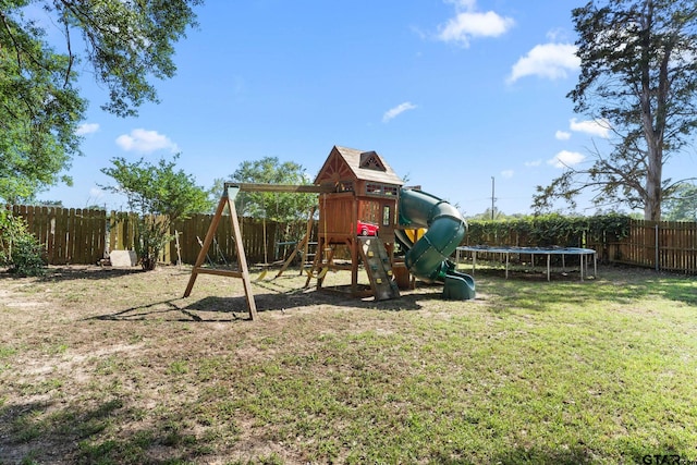 10769 Indigo Ln, Flint, TX 75762 - view of playground with a trampoline and a fenced backyard