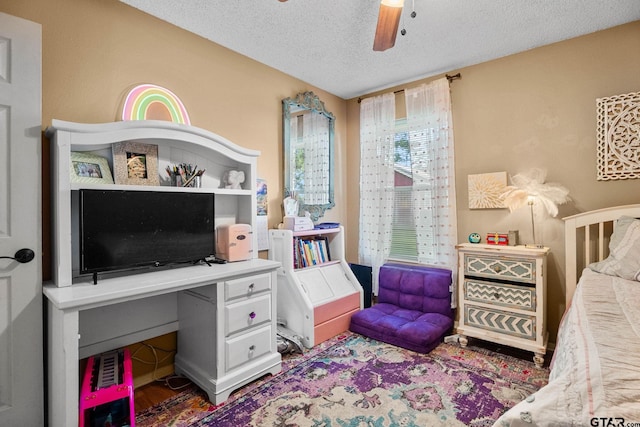 10769 Indigo Ln, Flint, TX 75762 - bedroom with a textured ceiling and a ceiling fan