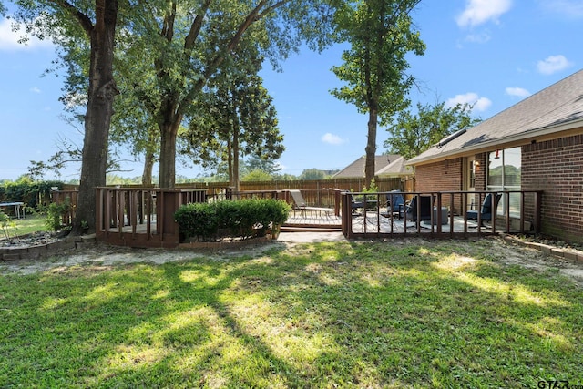 10769 Indigo Ln, Flint, TX 75762 - fenced backyard featuring a wooden deck