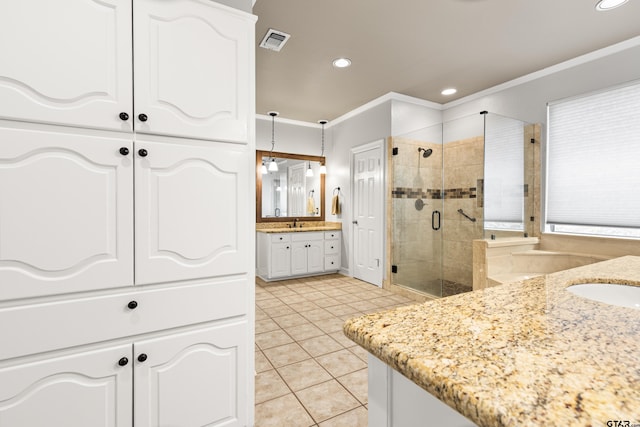 bathroom with visible vents, crown molding, tile patterned flooring, recessed lighting, and a shower stall
