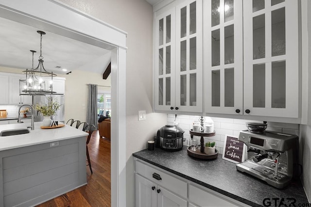 429 Coventry, Bullard, TX 75757 - kitchen with a sink, high end fridge, tasteful backsplash, and glass insert cabinets
