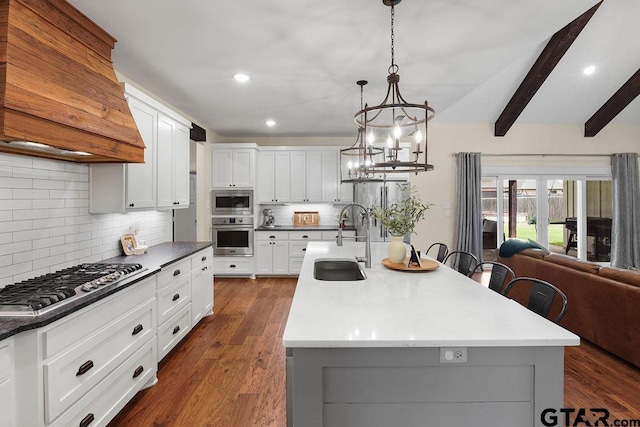 429 Coventry, Bullard, TX 75757 - kitchen featuring stainless steel appliances, a sink, premium range hood, backsplash, and open floor plan