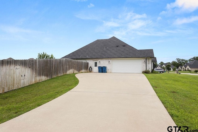 429 Coventry, Bullard, TX 75757 - view of side of property with an attached garage, concrete driveway, and a shingled roof