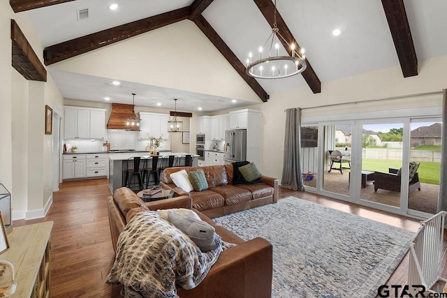 429 Coventry, Bullard, TX 75757 - living area with a chandelier, beam ceiling, high vaulted ceiling, wood finished floors, and recessed lighting