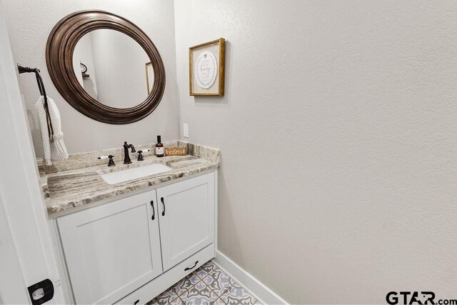 429 Coventry, Bullard, TX 75757 - bathroom with vanity and baseboards