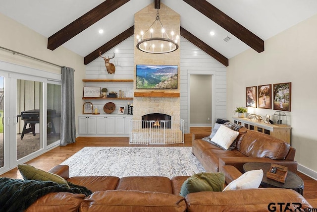 429 Coventry, Bullard, TX 75757 - living room featuring a chandelier, beam ceiling, light wood-style flooring, a fireplace, and high vaulted ceiling