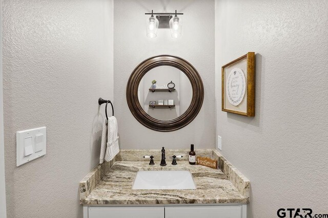 429 Coventry, Bullard, TX 75757 - bathroom featuring vanity and a textured wall