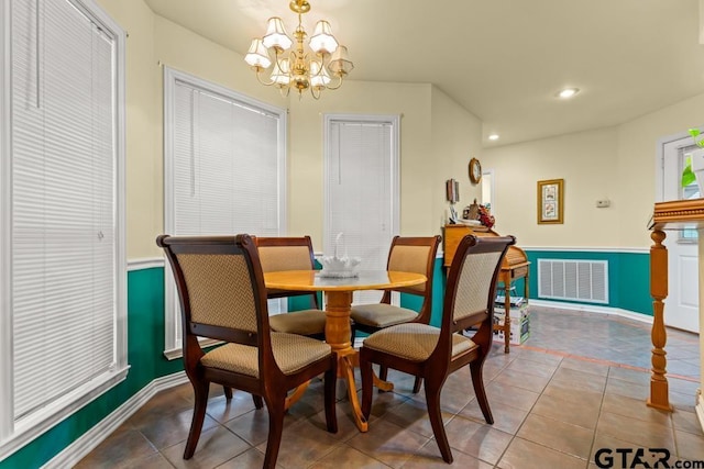 841 Pops Landing Rd, Ore City, TX 75683 - tiled dining room featuring a chandelier, recessed lighting, and wainscoting
