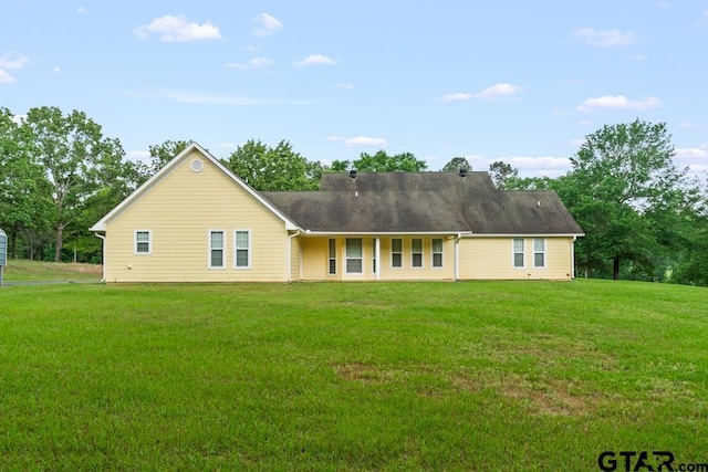 841 Pops Landing Rd, Ore City, TX 75683 - rear view of property with a lawn