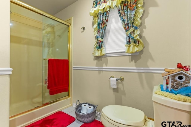 841 Pops Landing Rd, Ore City, TX 75683 - bathroom with a shower stall and tile patterned floors