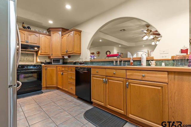 841 Pops Landing Rd, Ore City, TX 75683 - kitchen featuring black appliances, ceiling fan, light tile patterned flooring, recessed lighting, and arched walkways