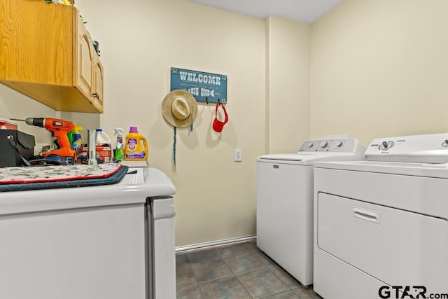 841 Pops Landing Rd, Ore City, TX 75683 - laundry room with cabinet space and washing machine and dryer