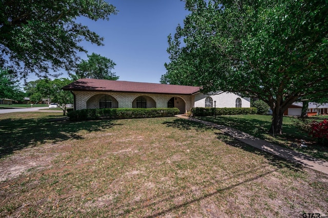 view of front of home with a front yard