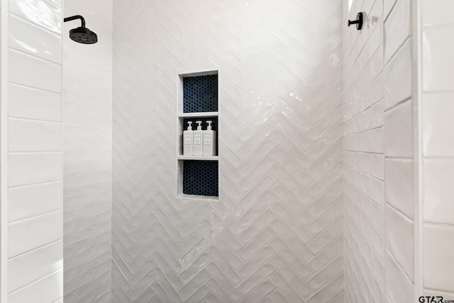 room details with a tile shower