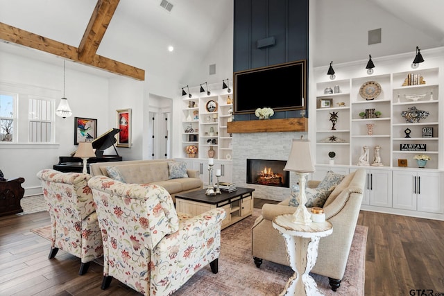 living room featuring beam ceiling, a stone fireplace, high vaulted ceiling, and dark hardwood / wood-style floors