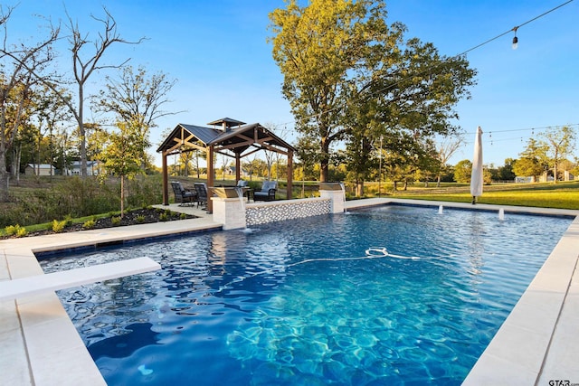 view of pool featuring a gazebo and a diving board