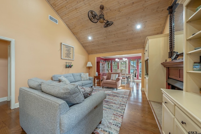 living room with light wood-type flooring, a chandelier, wood ceiling, and high vaulted ceiling