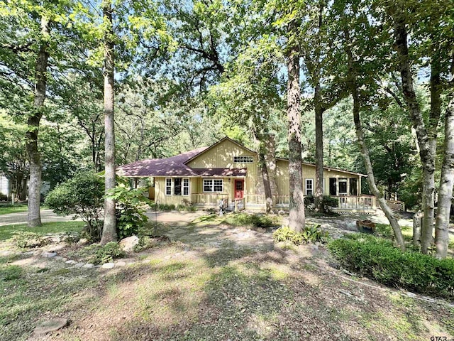 490 Branding Iron, Holly Lake Ranch, TX 75765 - ranch-style house featuring a chimney