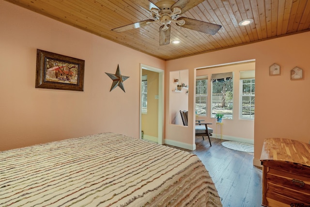 bedroom with ceiling fan, hardwood / wood-style floors, crown molding, and wood ceiling